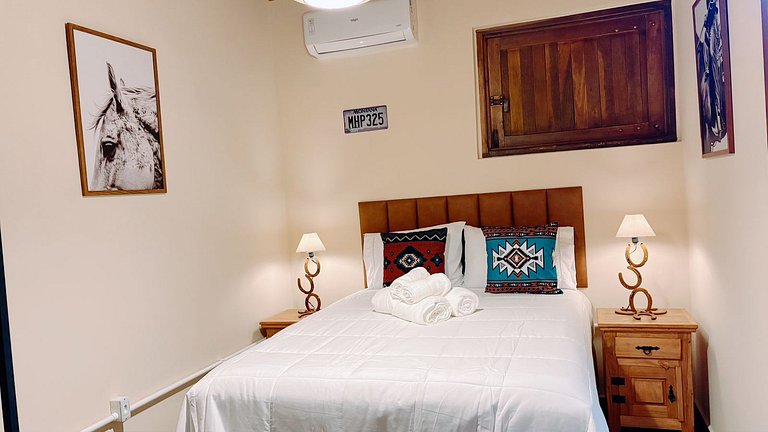 Experiência em celeiro com cavalos à porta