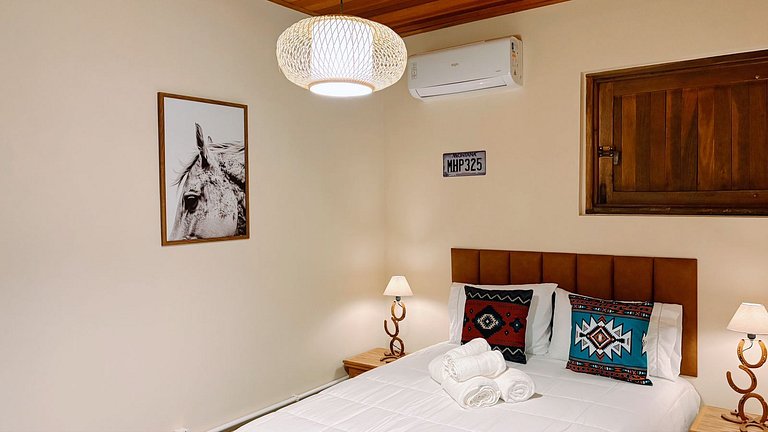 Experiência em celeiro com cavalos à porta